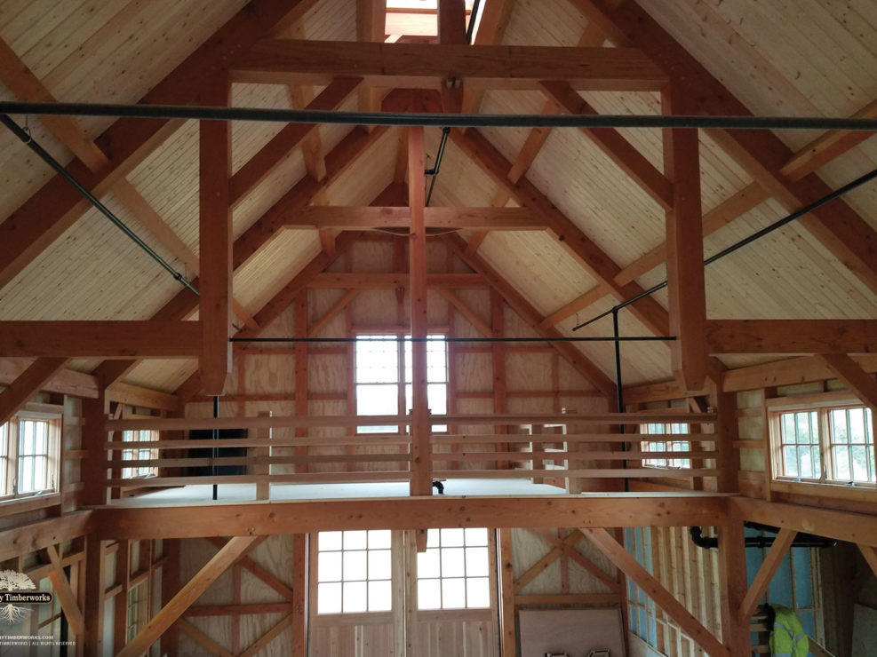 Timber Frame Barn Interior Loft Truss and Steel Rods Ceiling