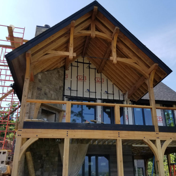 Timber Frame Home construction with Hammerbeam Truss